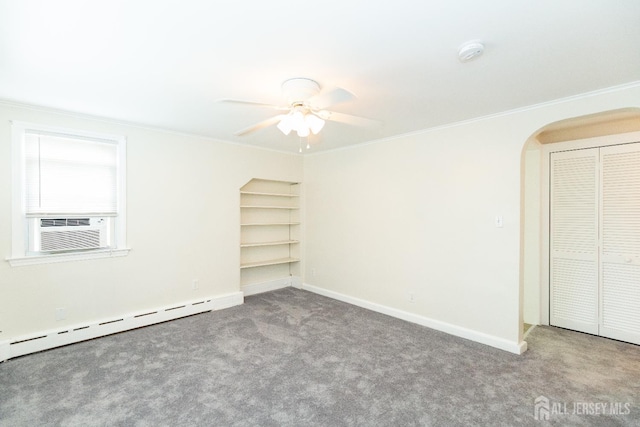 200 Plainfield Rd, Edison, NJ 08820 - unfurnished bedroom with baseboard heating, carpet floors, ornamental molding, cooling unit, and arched walkways