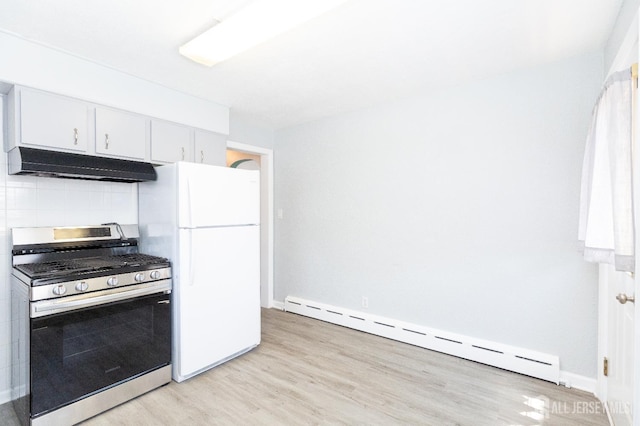 200 Plainfield Rd, Edison, NJ 08820 - kitchen with gas range, under cabinet range hood, a baseboard heating unit, freestanding refrigerator, and light wood-style floors