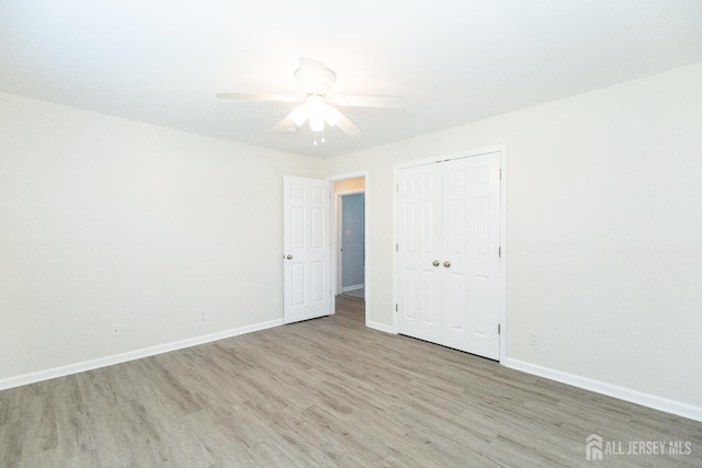 200 Plainfield Rd, Edison, NJ 08820 - unfurnished bedroom with wood finished floors, a closet, and ceiling fan