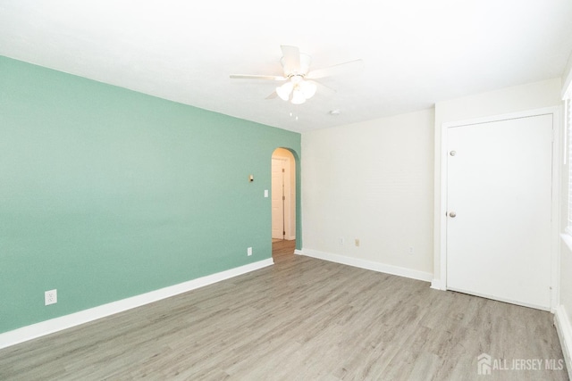 200 Plainfield Rd, Edison, NJ 08820 - spare room with wood finished floors, ceiling fan, and arched walkways