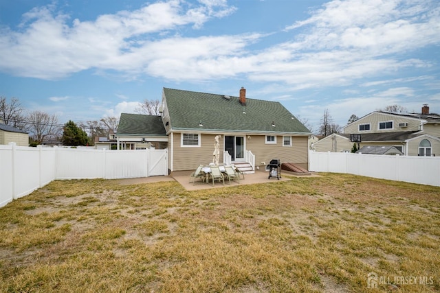 57 Athens Ave, Old Bridge, NJ 08879 - rear view of property featuring entry steps, a patio, and a chimney