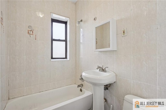 57 Corbin Ave Unit 24, Jersey City, NJ 07306 - full bathroom featuring tile walls and  shower combination