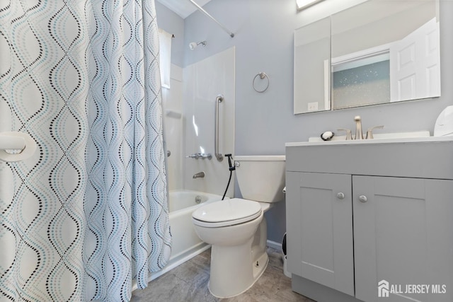 bathroom featuring toilet, shower / bath combo with shower curtain, and vanity