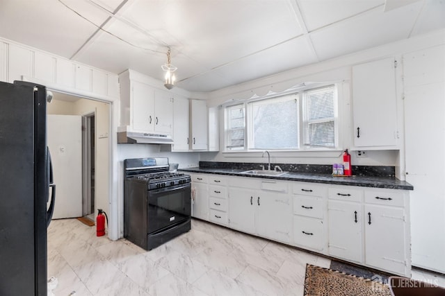 kitchen with sink, white cabinets, and black appliances