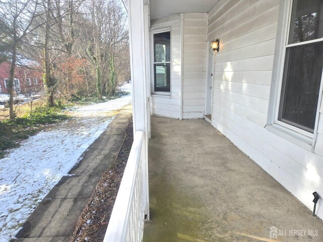 view of snow covered patio