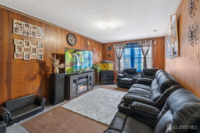 349 Livingston Ave, New Brunswick, NJ 08901 - living area featuring wooden walls, carpet flooring, and a fireplace