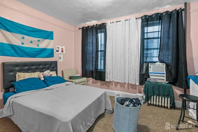349 Livingston Ave, New Brunswick, NJ 08901 - carpeted bedroom with baseboards and cooling unit