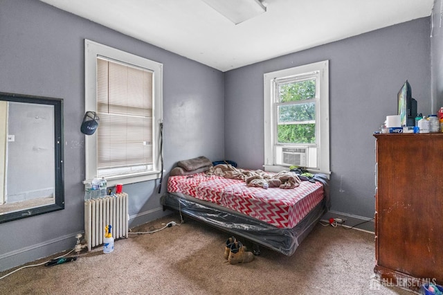 349 Livingston Ave, New Brunswick, NJ 08901 - carpeted bedroom with radiator heating unit, cooling unit, attic access, and baseboards