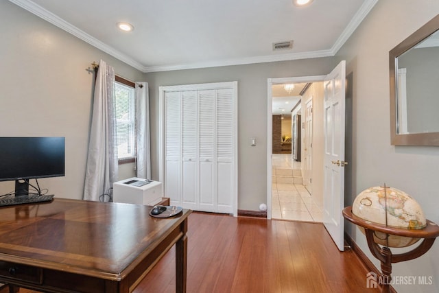 office area with crown molding and hardwood / wood-style floors