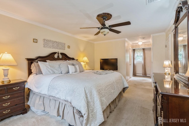 bedroom featuring ornamental molding, light carpet, and ceiling fan