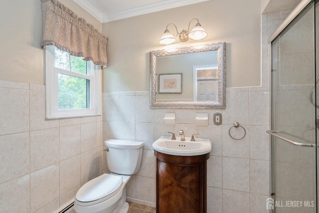 bathroom featuring tile walls, vanity, ornamental molding, toilet, and walk in shower