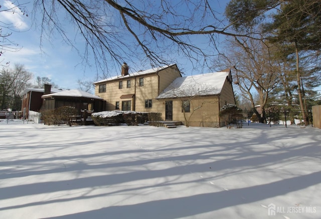 view of snow covered property