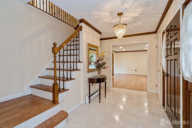 tiled entryway with crown molding, a notable chandelier, and a baseboard heating unit