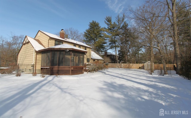 exterior space with a sunroom