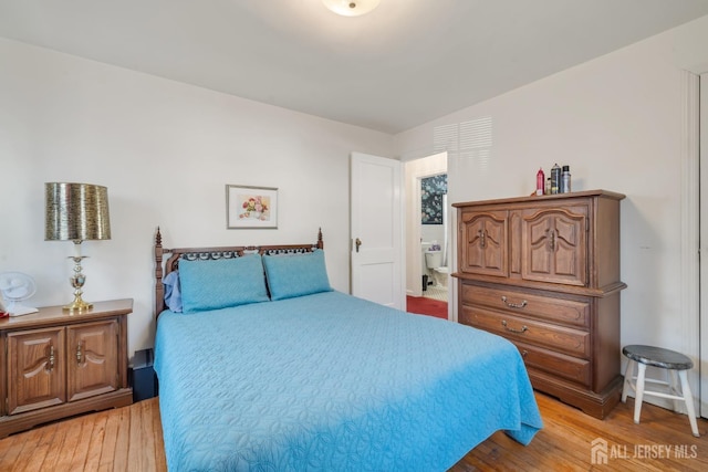 bedroom with light wood-type flooring