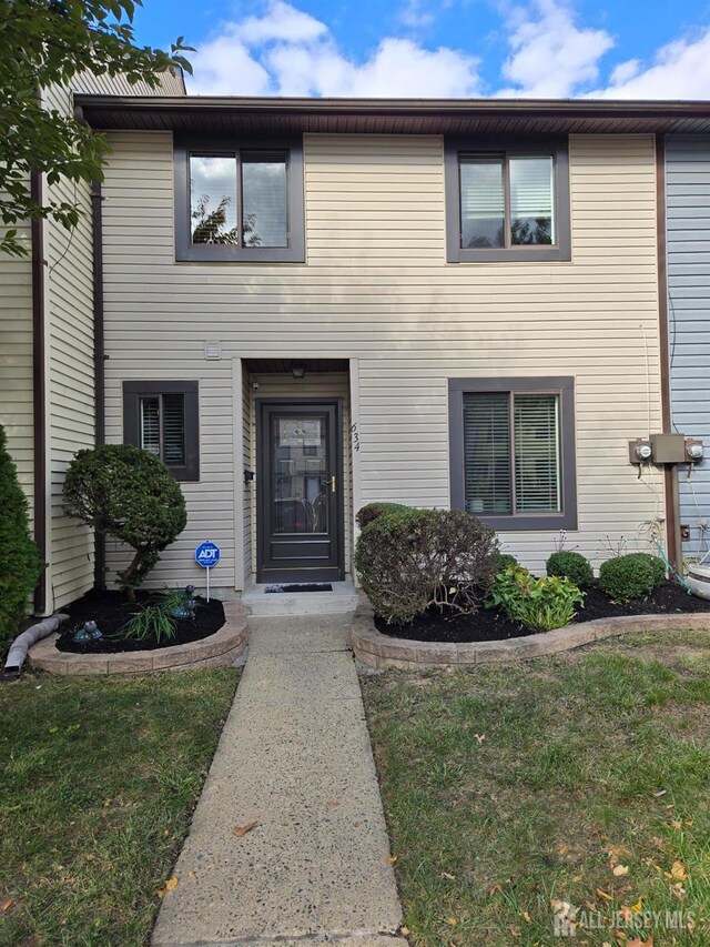 view of property with a front yard