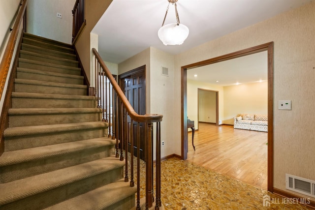 19 Redcoat Dr, East Brunswick, NJ 08816 - stairs featuring wood finished floors and recessed lighting