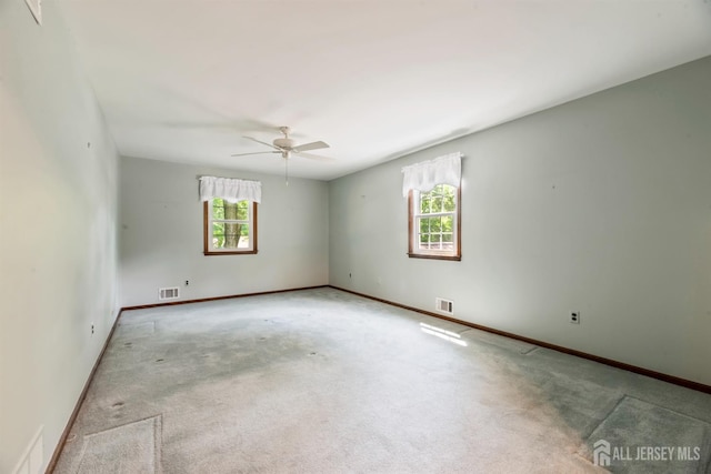 19 Redcoat Dr, East Brunswick, NJ 08816 - spare room with a ceiling fan and carpet floors