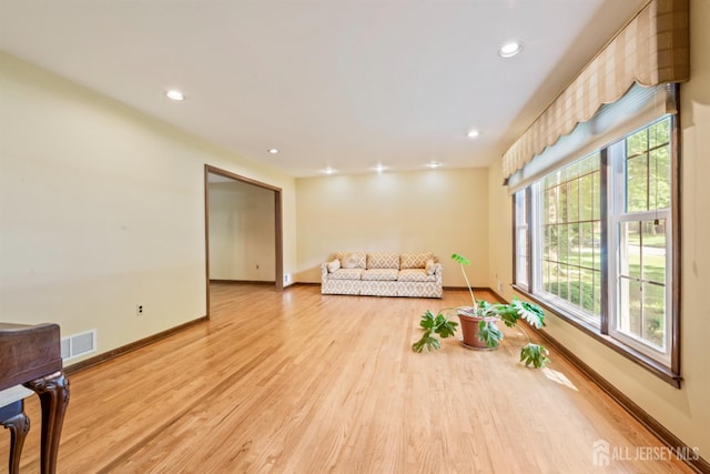 19 Redcoat Dr, East Brunswick, NJ 08816 - living area featuring light wood-style flooring and recessed lighting