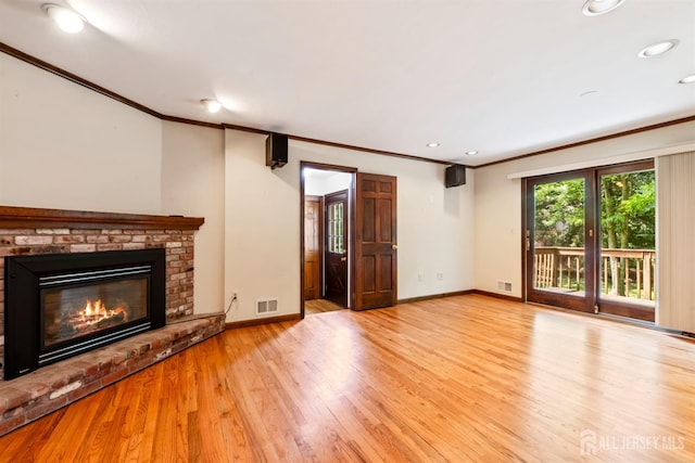 19 Redcoat Dr, East Brunswick, NJ 08816 - unfurnished living room featuring crown molding, wood finished floors, recessed lighting, and a brick fireplace