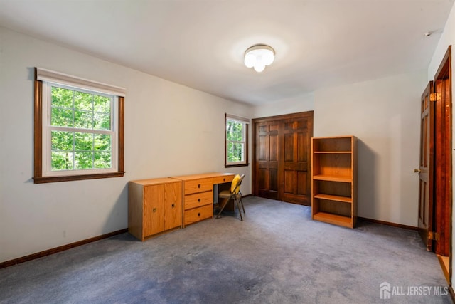 19 Redcoat Dr, East Brunswick, NJ 08816 - carpeted bedroom featuring a desk and baseboards