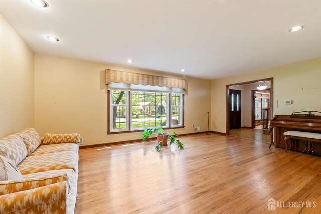 19 Redcoat Dr, East Brunswick, NJ 08816 - living room featuring light wood-style floors and recessed lighting