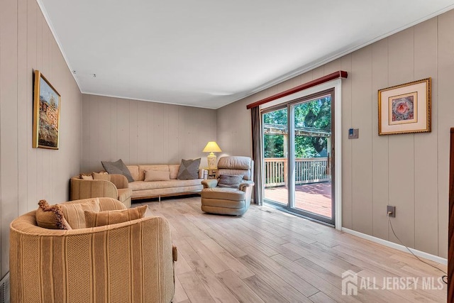 27 Appleby Ln, East Brunswick, NJ 08816 - living area with light wood-type flooring and crown molding