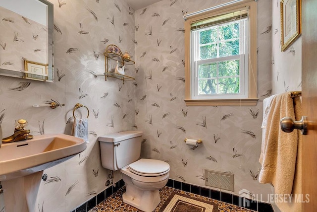 27 Appleby Ln, East Brunswick, NJ 08816 - half bath featuring toilet and a sink