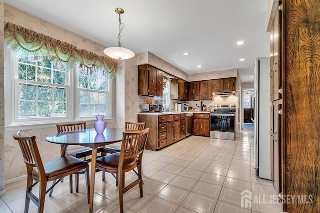 27 Appleby Ln, East Brunswick, NJ 08816 - kitchen with stainless steel appliances, light countertops, range hood, recessed lighting, and pendant lighting