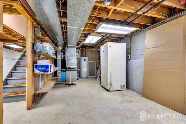 27 Appleby Ln, East Brunswick, NJ 08816 - unfinished below grade area featuring water heater and stairs