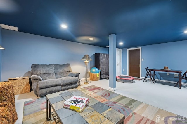 carpeted living room featuring recessed lighting and baseboards