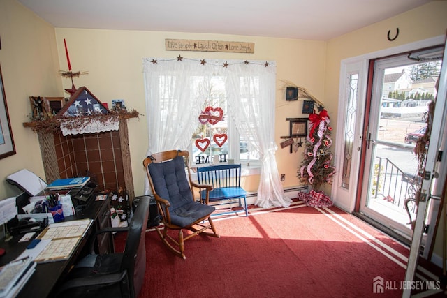 living area with carpet