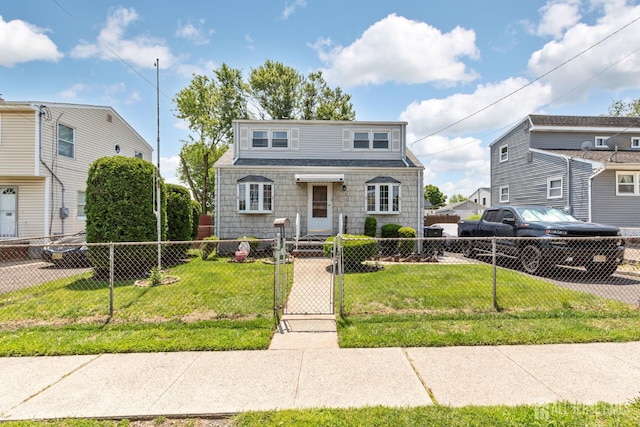 164 Holly St, Port Reading, NJ 07064 - view of front facade with a fenced front yard and a gate