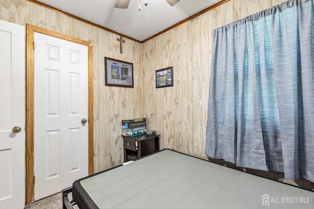 164 Holly St, Port Reading, NJ 07064 - bedroom featuring ornamental molding, wooden walls, and ceiling fan