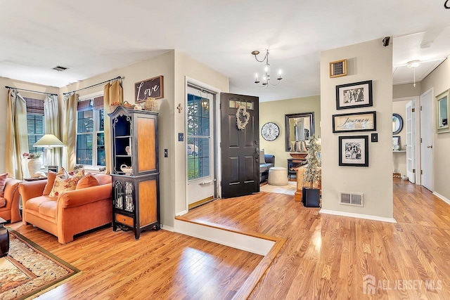 20 Sagamore Ave, Edison, NJ 08820 - foyer entrance featuring wood finished floors and a chandelier