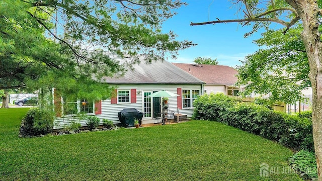 20 Sagamore Ave, Edison, NJ 08820 - rear view of property with a yard and a shingled roof