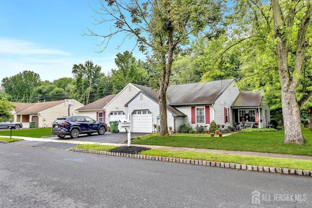 20 Sagamore Ave, Edison, NJ 08820 - view of front of home featuring a garage, driveway, and a front lawn