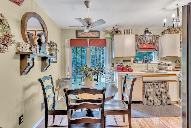 20 Sagamore Ave, Edison, NJ 08820 - dining space with light wood-style floors, healthy amount of natural light, and a ceiling fan