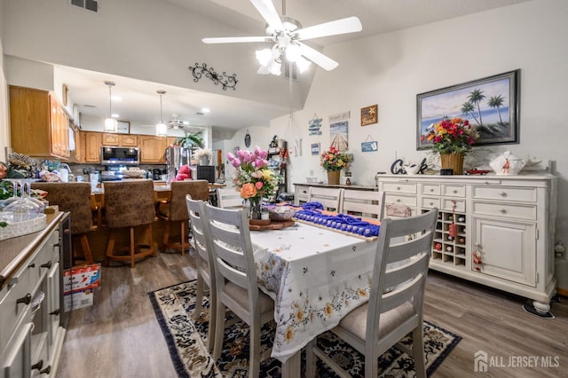 1617 Sweetbay Dr, Toms River, NJ 08755 - dining room featuring dark wood-style floors, a ceiling fan, and high vaulted ceiling