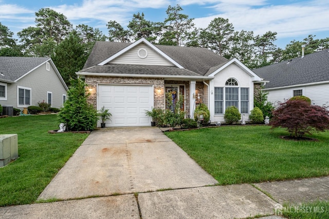 1617 Sweetbay Dr, Toms River, NJ 08755 - view of front facade with driveway, a garage, a front lawn, and a shingled roof