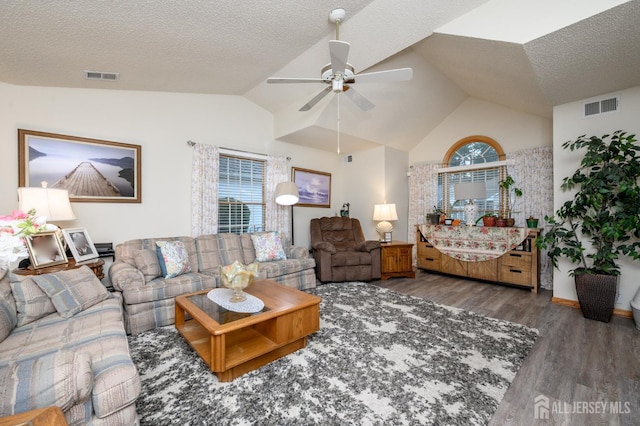 1617 Sweetbay Dr, Toms River, NJ 08755 - living room with wood finished floors, ceiling fan, plenty of natural light, a textured ceiling, and high vaulted ceiling
