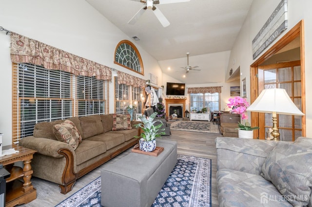 1617 Sweetbay Dr, Toms River, NJ 08755 - living room with ceiling fan, wood finished floors, a fireplace, and high vaulted ceiling