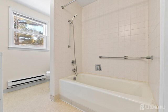 full bath featuring shower / bathtub combination, baseboard heating, and toilet