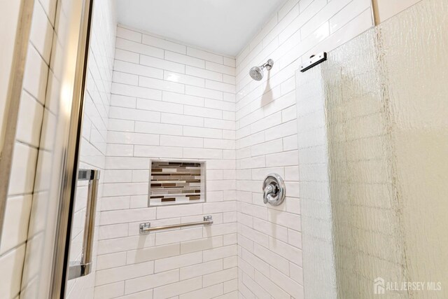 full bath featuring a stall shower