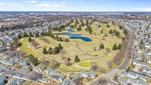 aerial view featuring a water view, a residential view, and golf course view