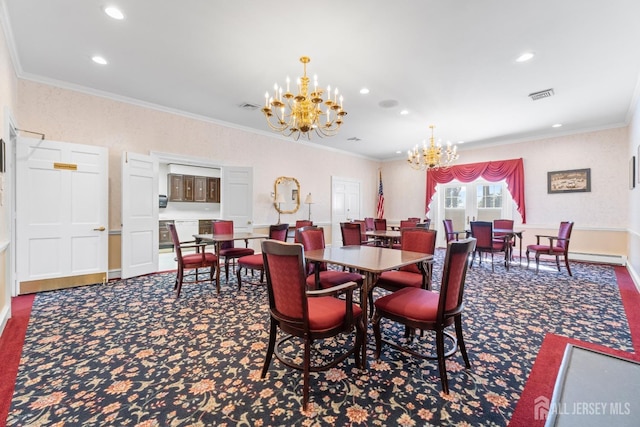 dining space featuring carpet floors, an inviting chandelier, visible vents, and crown molding