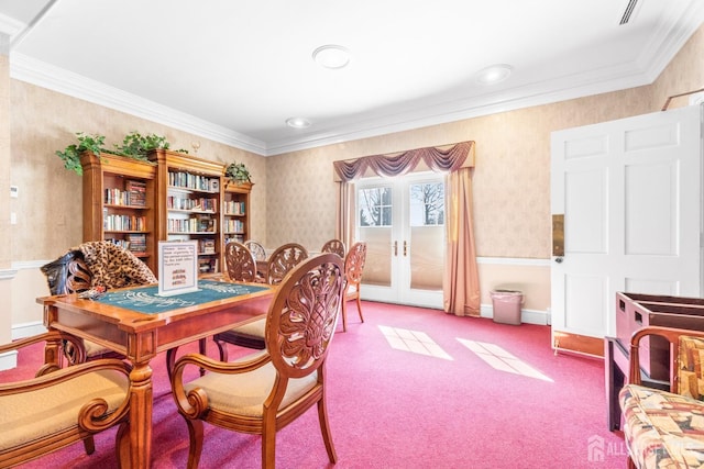 carpeted dining area featuring french doors, ornamental molding, visible vents, and wallpapered walls