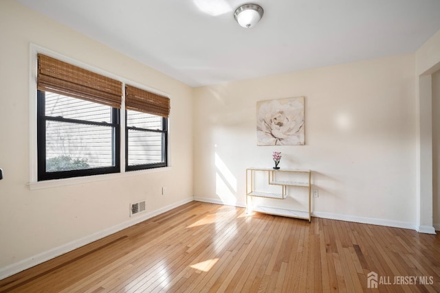 8 Highview Dr, Woodbridge Proper, NJ 07095 - spare room with wood-type flooring and baseboards