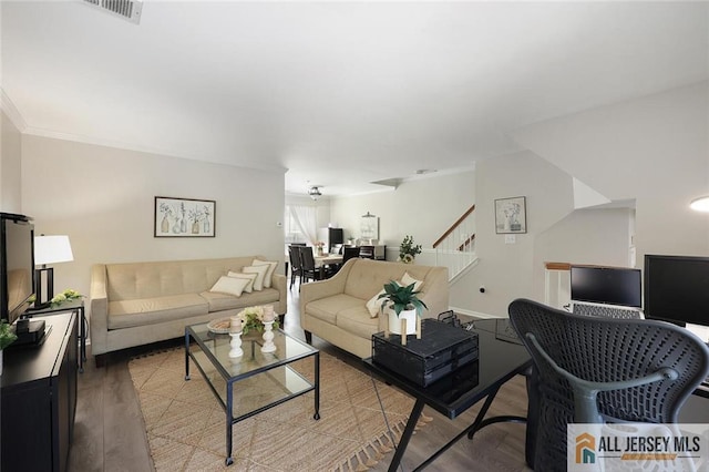 516 Great Beds Ct, Perth Amboy, NJ 08861 - living area featuring stairs, light wood-style flooring, crown molding, and a desk