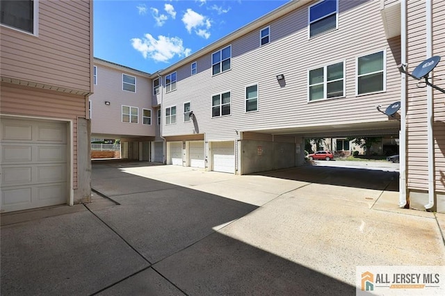 516 Great Beds Ct, Perth Amboy, NJ 08861 - view of rear view of house